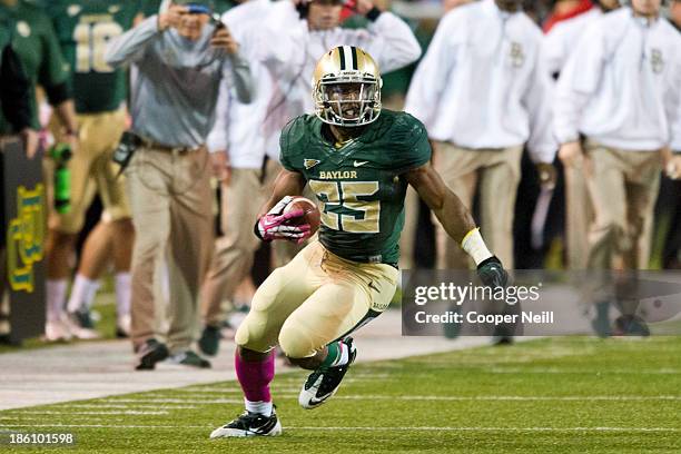 Lache Seastrunk of the Baylor Bears breaks free against the Iowa State Cyclones on October 19, 2013 at Floyd Casey Stadium in Waco, Texas.