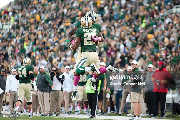 Lache Seastrunk of the Baylor Bears celebrates after scoring a touchdown against the Iowa State Cyclones on October 19, 2013 at Floyd Casey Stadium...