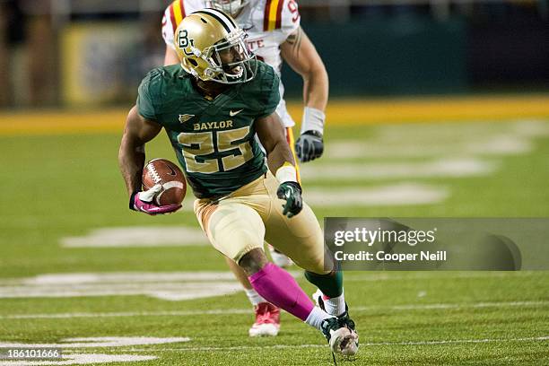 Lache Seastrunk of the Baylor Bears breaks free against the Iowa State Cyclones on October 19, 2013 at Floyd Casey Stadium in Waco, Texas.