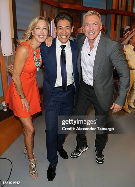 Lara Spencer, Johnny Lozada and Sam Champion are seen on the set of Despierta America for simulcast with "Good Morning America" and Fusion's the...