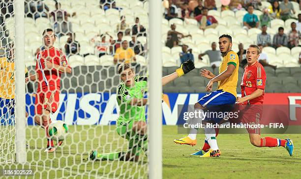 Mosquito of Brazil scores the opening goal during the FIFA U-17 World Cup UAE 2013 Round of 16 match between Brazil and Russia at the Mohamed Bin...