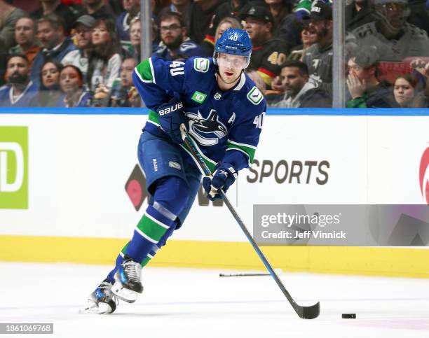Elias Pettersson of the Vancouver Canucks skates up ice during their NHL game against the Florida Panthers at Rogers Arena on December 14, 2023 in...