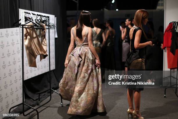 Models are seen backstage at the Julia Dalakian show during Mercedes-Benz Fashion Week Russia S/S 2014 on October 28, 2013 in Moscow, Russia.