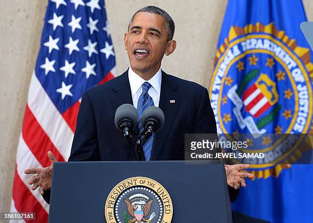 President Barack Obama speaks during an installation ceremony of new Federal Bureau of Investigation director James Comey at the FBI headquarters in...