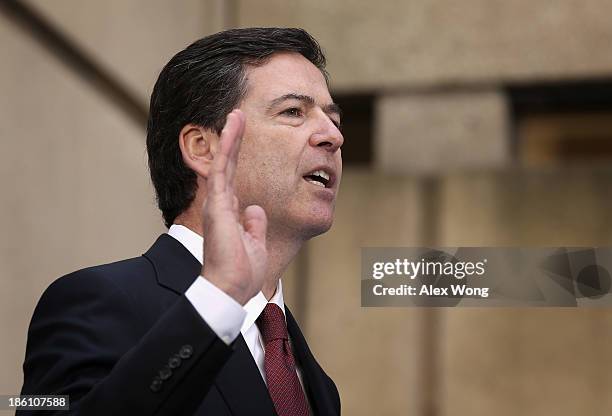 Director James Comey speaks during a ceremonial swearing-in ceremony at the FBI Headquarters October 28, 2013 in Washington, DC. Comey was officially...