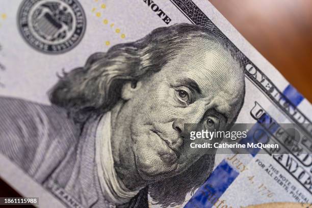 stack of u.s. paper bills - silver spoon in mouth stock pictures, royalty-free photos & images
