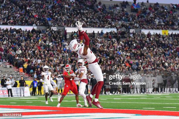 Safety Mehki Miller of the New Mexico State Aggies intercepts a pass in the endzone during the first half of the Isleta New Mexico Bowl against the...