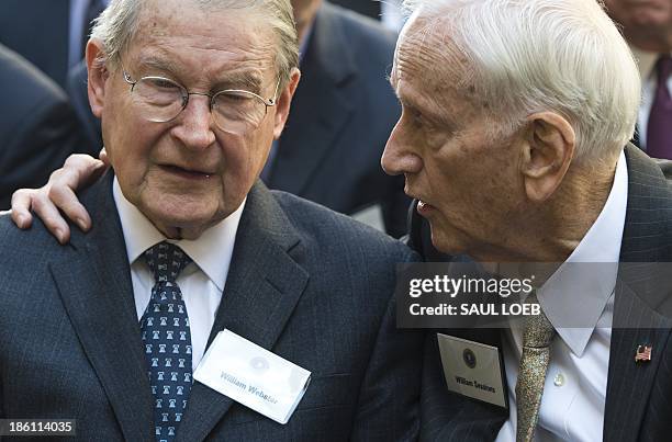 Former FBI Directors William Webster and William Sessions speak during the installation ceremony for FBI Director James Comey at Federal Bureau of...