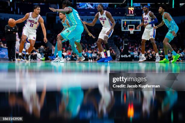 Jaden Springer of the Philadelphia 76ers brings the ball up court in the fourth quarter during their game against the Charlotte Hornets at Spectrum...