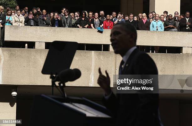 President Barack Obama makes remarks as FBI employees listen during a ceremonial swearing-in of FBI Director James Comey at the FBI Headquarters...