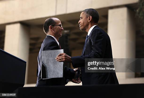 President Barack Obama shakes hands with Deputy FBI Director Sean Joyce during a ceremonial swearing-in of FBI Director James Comey at the FBI...