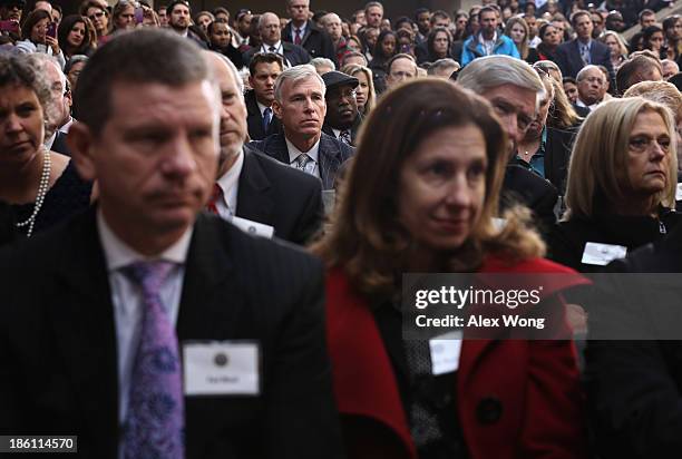 Guests attend the ceremonial swearing-in of FBI Director James Comey at the FBI Headquarters October 28, 2013 in Washington, DC. Comey was officially...