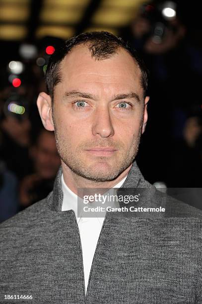 Actor Jude Law attends the UK Premiere of "Dom Hemingway" at The Curzon Mayfair on October 28, 2013 in London, England.