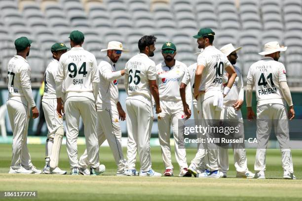 Aamir Jamal of Pakistan looks on after taking the wicket of Travis Head of Australia during day four of the Men's First Test match between Australia...