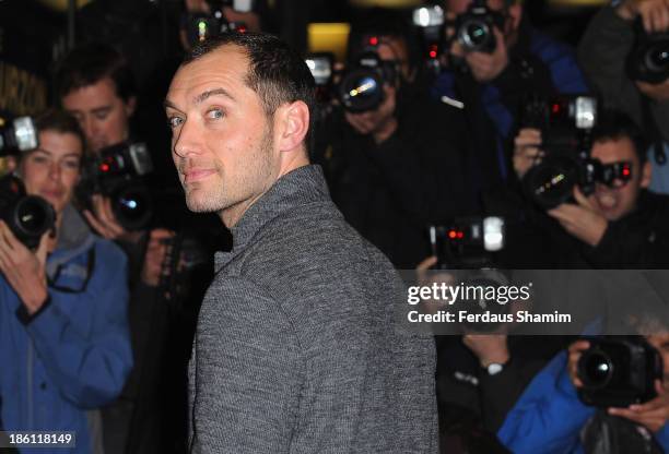 Jude Law attends the UK Premiere of "Dom Hemingway" at The Curzon Mayfair on October 28, 2013 in London, England.