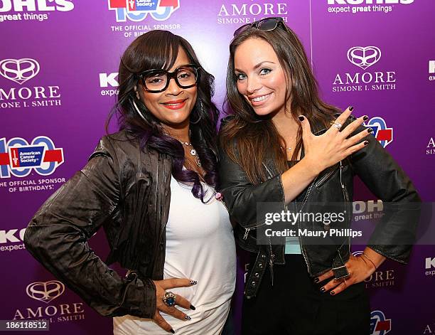 Simone I. Smith and guest attend Amore by Simone I. Smith Collection Debut at Kohl's on October 26, 2013 in Los Angeles, California.