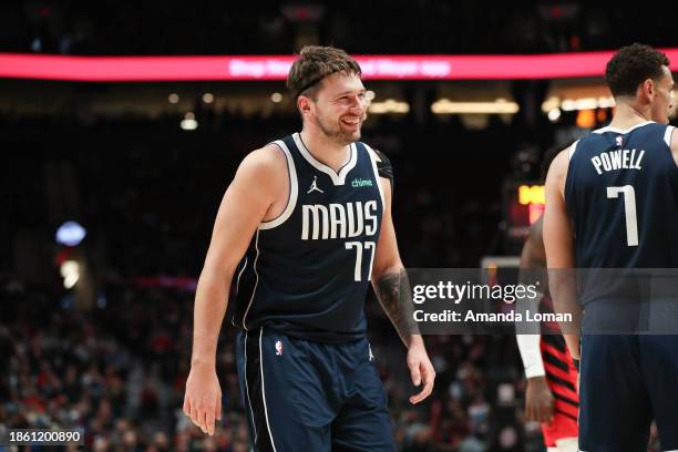 Luka Doncic of the Dallas Mavericks reacts during the second quarter against the Portland Trail Blazers at Moda Center on December 16, 2023 in...