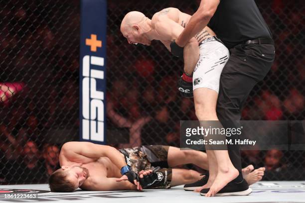 Josh Emmett of the United States reacts after knocking out Bryce Mitchell of the United States in a featherweight fight during the UFC 296: Edwards...