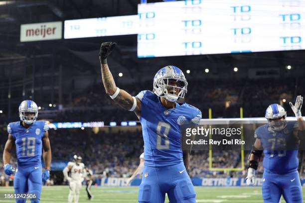 Josh Reynolds of the Detroit Lions reacts after a touchdown by Jahmyr Gibbs during the fourth quarter Denver Broncos at Ford Field on December 16,...
