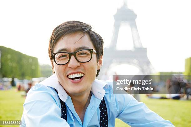 Young man at the Eiffel Tower