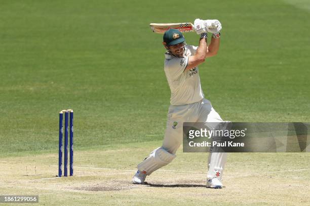 Mitchell Marsh of Australia bats during day four of the Men's First Test match between Australia and Pakistan at Optus Stadium on December 17, 2023...