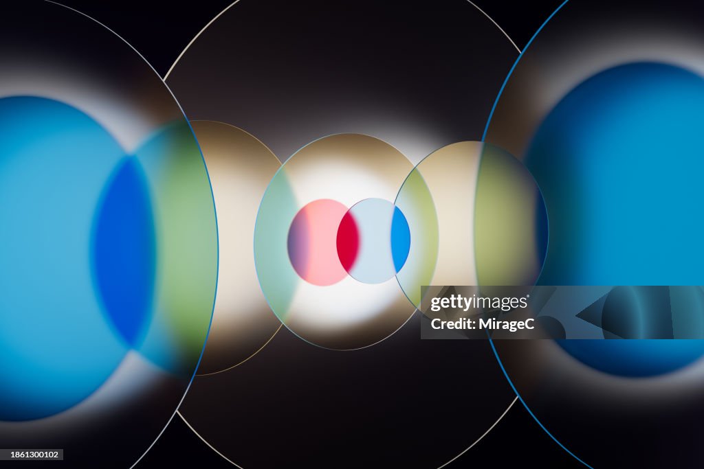Abstract Venn Diagram of Red and Blue Circular Glass Crossing