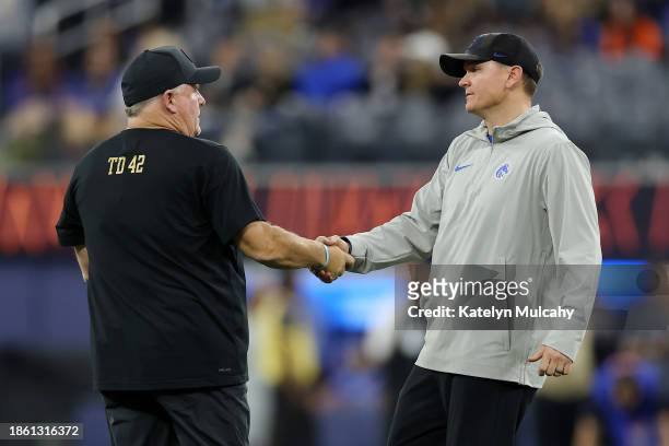 Head coach Chip Kelly of the UCLA Bruins greets Head coach Spencer Danielson of the Boise State Broncos after the win during the Starco Brands LA...
