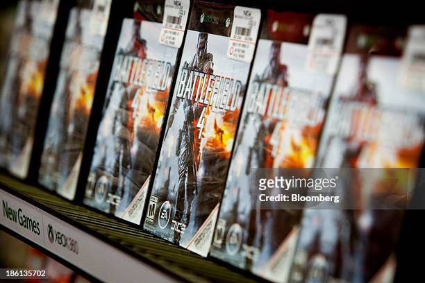 Pre-sale boxes of the Electronic Arts Inc. Battlefield 4 video game for Microsoft Corp. Xbox are displayed at a GameStop Corp. Store in West...