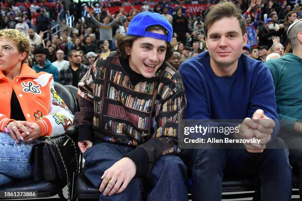 Timothée Chalamet and Ryan Friedkin attend a basketball game between the Los Angeles Clippers and the New York Knicks at Crypto.com Arena on December...