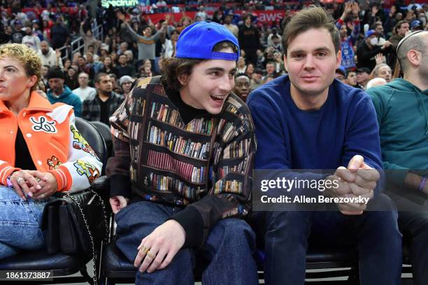 Timothée Chalamet and Ryan Friedkin attend a basketball game between the Los Angeles Clippers and the New York Knicks at Crypto.com Arena on December...