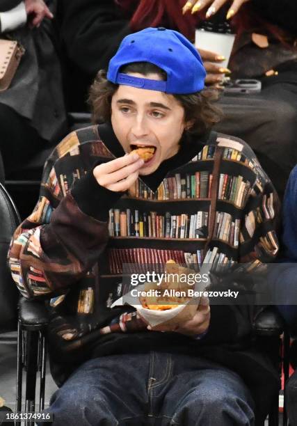 Timothée Chalamet attends a basketball game between the Los Angeles Clippers and the New York Knicks at Crypto.com Arena on December 16, 2023 in Los...