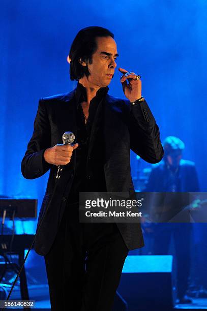 Nick Cave performs with The Bad Seeds at Hammersmith Apollo on October 28, 2013 in London, England.