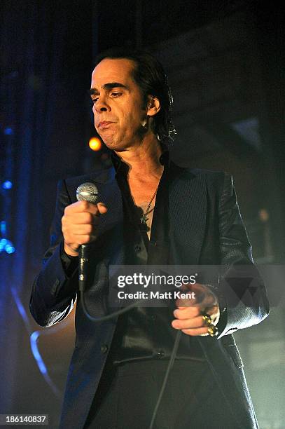 Nick Cave performs with The Bad Seeds at Hammersmith Apollo on October 28, 2013 in London, England.