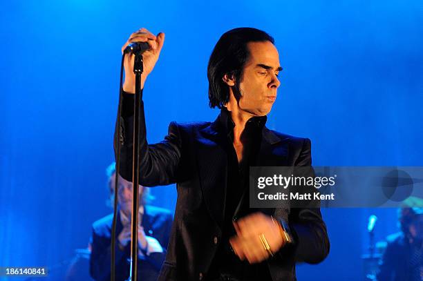 Nick Cave performs with The Bad Seeds at Hammersmith Apollo on October 28, 2013 in London, England.