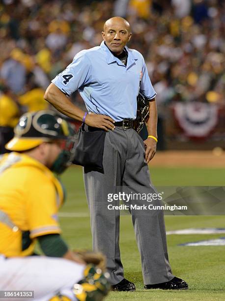 Major League umpire C. B. Bucknor looks on during Game Two of the American League Division Series between the Oakland Athletics and the Detroit...