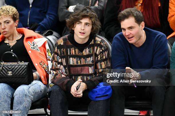 Timothée Chalamet and Ryan Friedkin attend a basketball game between the Los Angeles Clippers and the New York Knicks at Crypto.com Arena on December...