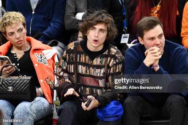 Timothée Chalamet and Ryan Friedkin attend a basketball game between the Los Angeles Clippers and the New York Knicks at Crypto.com Arena on December...