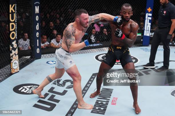 Colby Covington punches Leon Edwards of Jamaica the UFC welterweight championship fight during the UFC 296 event at T-Mobile Arena on December 16,...