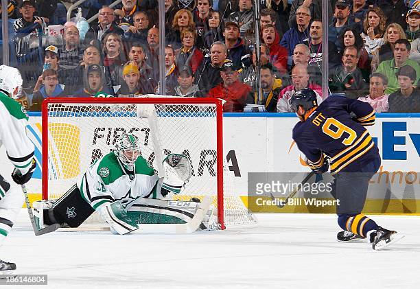 Steve Ott of the Buffalo Sabres scores a second period shot against Kari Lehtonen of the Dallas Stars on October 28, 2013 at the First Niagara Center...