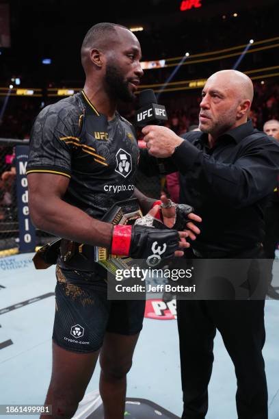 Leon Edwards of Jamaica is interviewed by Joe Rogan in the UFC welterweight championship fight during the UFC 296 event at T-Mobile Arena on December...