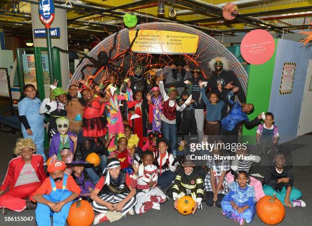 Brooklyn Nets' Reggie Evans, Andray Blatche, Tyshawn Taylor and Nets Super Hero BrooklyKnight host a Halloween Monster Mash for 50 children from New...