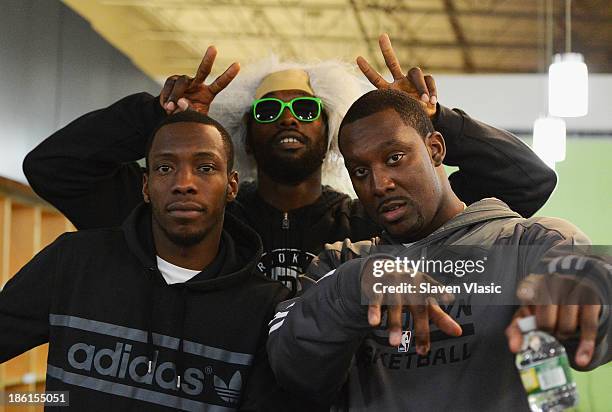 Brooklyn Nets' Tyshawn Taylor, Reggie Evans and Andray Blatche host a Halloween Monster Mash for 50 children from New York City Housing Authority...