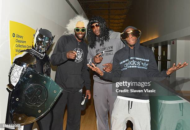 Nets Super Hero BrooklyKnight, Brooklyn Nets' Reggie Evans, Andray Blatche and Tyshawn Taylor host a Halloween Monster Mash for 50 kids at The...