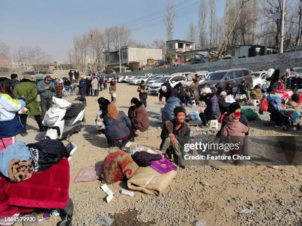 Villagers stay outdoors after the earthquake in Jishishan county in northwest China's Gansu province Tuesday, Dec. 19, 2023. A magnitude-6.2...