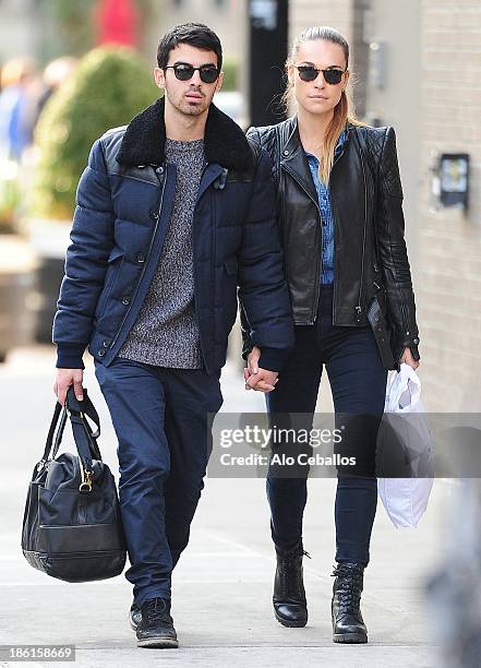 Joe Jonas and Blanda Eggenschwiler are seen in the Meat Packing District on October 28, 2013 in New York City.