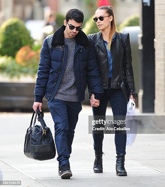 Joe Jonas and Blanda Eggenschwiler are seen in the Meat Packing District on October 28, 2013 in New York City.