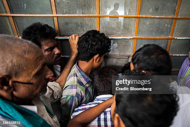 Patients queue to receive test results at the Acharya Tulsi Regional Cancer Treatment & Research Institute in Bikaner, Rajasthan, India on Thursday,...