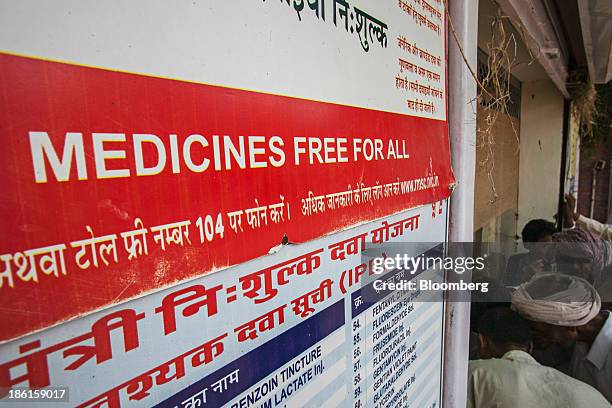 Patients and patient's relatives queue up to receive free medicine from a dispensary at the Acharya Tulsi Regional Cancer Treatment & Research...