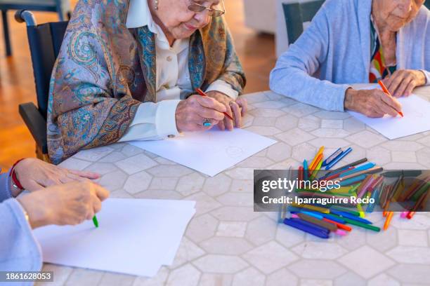 Senior Collaborative Coloring 17 Adult Colouring Mandala Stock Photos, High-Res Pictures, and Images ...