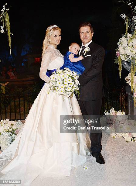 Holly Madison, Rainbow Rotella and Pasquale Rotella pose for photos after Holly and Pasquale's wedding ceremony at Disneyland on September 10, 2013...